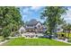 Expansive backyard featuring a pool, patio, and lush landscaping at 9785 Anchor Dr., Longs, SC 29568
