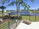 This waterfront backyard features a patio area, grass, and nice views of the water at 9785 Anchor Dr., Longs, SC 29568