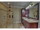 Luxurious bathroom featuring a spacious walk-in shower and double vanity at 9785 Anchor Dr., Longs, SC 29568