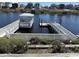This backyard has a personal covered boat dock on the waterfront for recreational boating at 9785 Anchor Dr., Longs, SC 29568