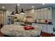 Gourmet kitchen featuring a large island with granite countertop and custom lighting at 9785 Anchor Dr., Longs, SC 29568