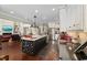 Open-concept kitchen with island, wine storage, and stainless steel appliances at 9785 Anchor Dr., Longs, SC 29568