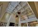 Expansive living room highlighting high ceilings, and a view of the upstairs hallway at 9785 Anchor Dr., Longs, SC 29568