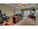 Well-lit home office space with a ceiling fan and a view to the outdoors at 9785 Anchor Dr., Longs, SC 29568