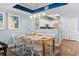 This dining area has a light wood table with seating for six and connects to the kitchen at 100 N Beach Blvd. # 1608, North Myrtle Beach, SC 29582