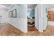 Hallway shot featuring wainscotting and ceramic tile leading into a bedroom at 100 N Beach Blvd. # 1608, North Myrtle Beach, SC 29582