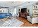 Inviting living room showcases an entertainment center, plush seating, and an open floor plan at 100 N Beach Blvd. # 1608, North Myrtle Beach, SC 29582