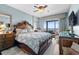 Beautiful bedroom with a king bed, balcony access, and serene ocean views through sliding glass doors at 100 N Beach Blvd. # 1608, North Myrtle Beach, SC 29582