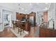 Well-appointed kitchen featuring custom cabinetry, stainless steel appliances, and a convenient breakfast bar at 120 Swallowtail Ct., Little River, SC 29566