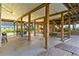 Large covered patio with outdoor seating and a hammock for relaxation at 1257 Ocean Blvd., Holden Beach, NC 28462
