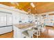 Bright, modern kitchen with granite countertops, large island with seating, and stainless steel appliances at 1257 Ocean Blvd., Holden Beach, NC 28462