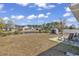 Backyard with a storage shed and seating area near a pond at 1336 Gailard Dr., Conway, SC 29526