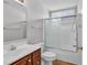 Clean bathroom featuring a wood vanity, shower and tub combination, and tile floors at 1336 Gailard Dr., Conway, SC 29526