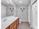 Bright bathroom featuring spacious vanity with sink, toilet and a walk-in shower at 1336 Gailard Dr., Conway, SC 29526