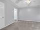 Spacious bedroom featuring plush carpet, a ceiling fan and adjoining bathroom at 1336 Gailard Dr., Conway, SC 29526