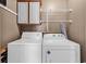Laundry room with shelving, cabinet and modern washer and dryer at 1336 Gailard Dr., Conway, SC 29526