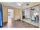 Bright living room featuring tile floors, natural light, stylish decor with an open floor plan to dining area at 1336 Gailard Dr., Conway, SC 29526