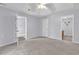 Large main bedroom with plush carpet, ensuite bathroom, and ceiling fan at 1336 Gailard Dr., Conway, SC 29526