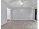 Main bedroom features a ceiling fan, ensuite bathroom and plush carpet at 1336 Gailard Dr., Conway, SC 29526