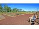 A tranquil community garden with raised beds, benches, and beautiful scenery at 1356 Palm Springs Paloma Dr, Longs, SC 29568