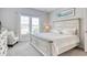 Bright Primary bedroom with neutral colors, natural light, and a cozy armchair at 1439 Castleberry Pl., Myrtle Beach, SC 29588