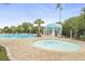 Gathering-friendly pool area with mushroom fountain and plenty of seating at 1439 Castleberry Pl., Myrtle Beach, SC 29588