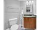 Well-lit bathroom featuring a modern vanity with granite counter top and ample storage at 145 South Dunes Dr. # 503, Pawleys Island, SC 29585