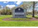 Community entrance sign with manicured landscaping and clear branding for vacation rentals and coffee services at 145 South Dunes Dr. # 503, Pawleys Island, SC 29585