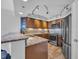 Well equipped kitchen featuring stainless steel appliances and granite countertops at 145 South Dunes Dr. # 503, Pawleys Island, SC 29585