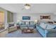Bright and airy living room with comfortable seating and decor at 145 South Dunes Dr. # 503, Pawleys Island, SC 29585