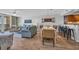 Open concept living and dining space with a view of the kitchen and seating at 145 South Dunes Dr. # 503, Pawleys Island, SC 29585