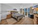 Bright main bedroom boasts balcony access with ocean views, creating a serene retreat at 145 South Dunes Dr. # 503, Pawleys Island, SC 29585