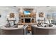Inviting living room with a stone fireplace and comfortable seating at 1586 Jardine Loop, Little River, SC 29566