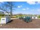 Outdoor community picnic area with grill and lake view at 1586 Jardine Loop, Little River, SC 29566