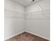 Empty walk-in closet featuring white wire shelving at 1586 Jardine Loop, Little River, SC 29566