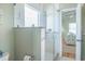 Bathroom featuring a glass-enclosed shower with tiled walls, and view to bedroom at 162 Norris Dr., Pawleys Island, SC 29585