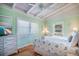 Bright bedroom features vaulted ceilings, wood floors and coastal decor at 162 Norris Dr., Pawleys Island, SC 29585