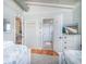 Bright bedroom offers beachy decor and access to the bathroom at 162 Norris Dr., Pawleys Island, SC 29585