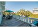Spacious deck with outdoor furniture overlooking lush landscaping, perfect for relaxing and entertaining at 162 Norris Dr., Pawleys Island, SC 29585