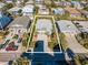 Charming coastal home surrounded by lush landscaping and palm trees with ample parking at 162 Norris Dr., Pawleys Island, SC 29585