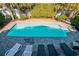 Aerial view of a private pool area with lounge chairs and beautifully landscaped surroundings at 162 Norris Dr., Pawleys Island, SC 29585