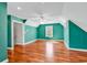 Large bonus room with hardwood floors, mini-split system, and neutral colored walls at 182 Duck Blind Trail, Myrtle Beach, SC 29588