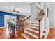 Dining area adjacent to the kitchen features hardwood floors and lots of natural light with a stairway to the right at 182 Duck Blind Trail, Myrtle Beach, SC 29588