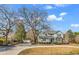 Charming two-story home with manicured landscaping and a circular driveway, offering classic curb appeal at 182 Duck Blind Trail, Myrtle Beach, SC 29588