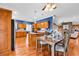 Stylish kitchen with wooden cabinetry, stainless appliances, a center island, and adjacent dining area at 182 Duck Blind Trail, Myrtle Beach, SC 29588