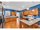 Well-appointed kitchen with custom wood cabinets, stainless steel appliances, and ample counter space at 182 Duck Blind Trail, Myrtle Beach, SC 29588