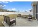 Spacious backyard patio with patio furniture, perfect for outdoor entertaining or quiet relaxation at 211 Copperwood Loop, Conway, SC 29526