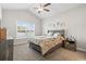 Bright bedroom with a ceiling fan, vaulted ceiling, and a bedside table at 211 Copperwood Loop, Conway, SC 29526