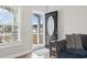 Interior view of front door and window, providing great natural light at 211 Copperwood Loop, Conway, SC 29526