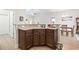 Kitchen featuring dark cabinetry, granite countertops, stainless steel appliances, and modern fixtures at 211 Copperwood Loop, Conway, SC 29526